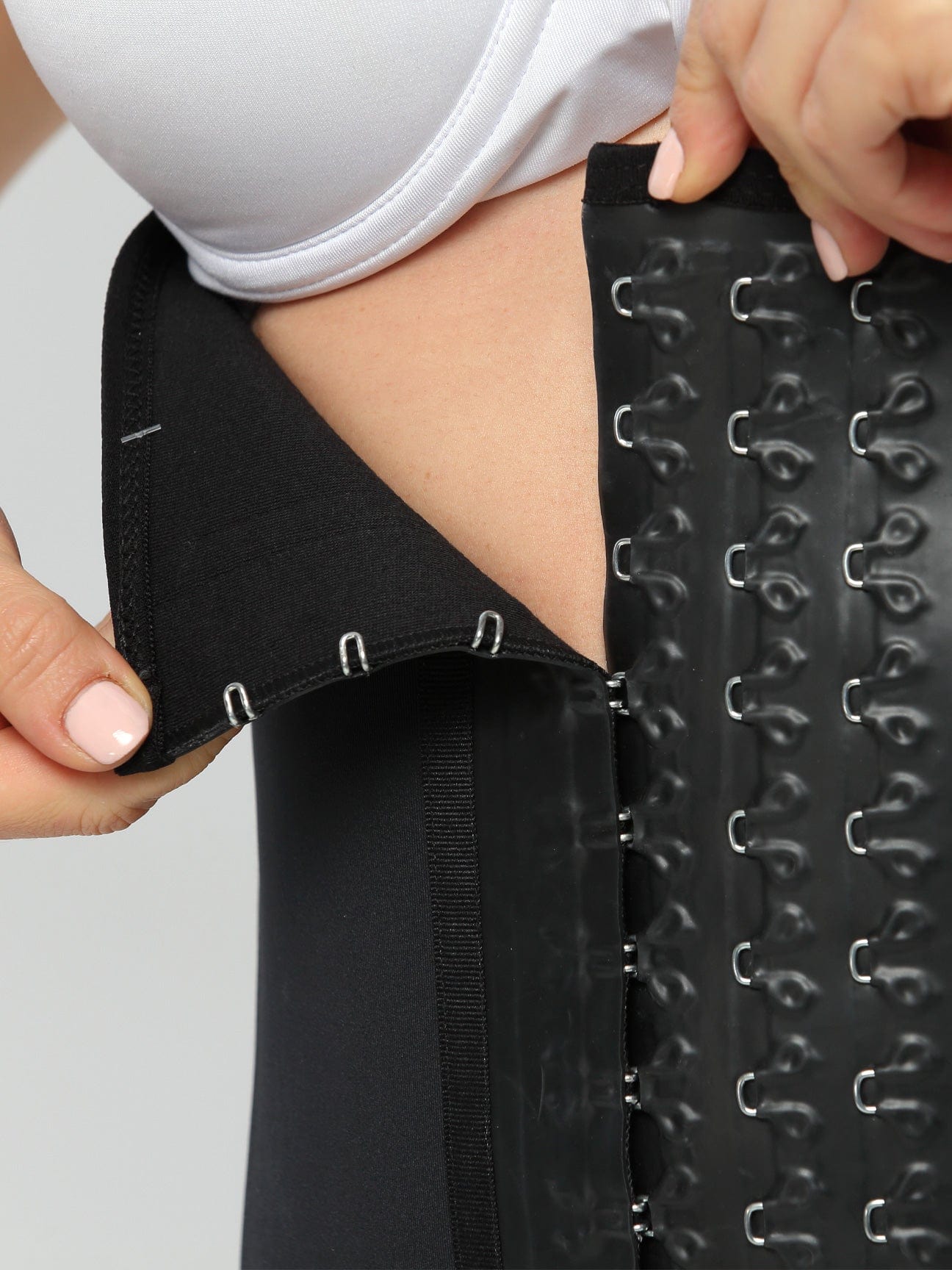 Black Sports Latex Covered Workout Waist Trainer hook functionality.
