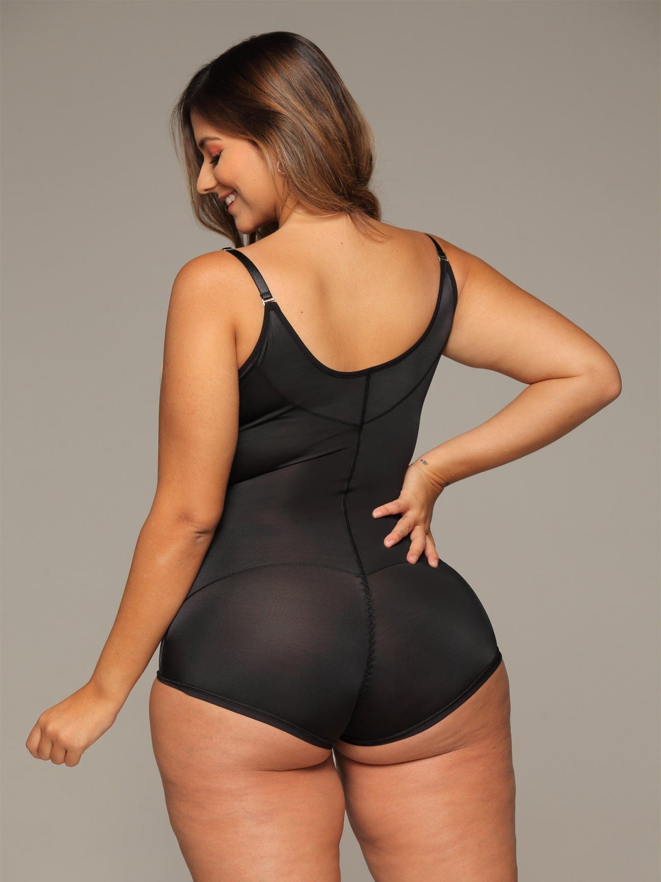 Back butt view of the black invisible body suit with panty.